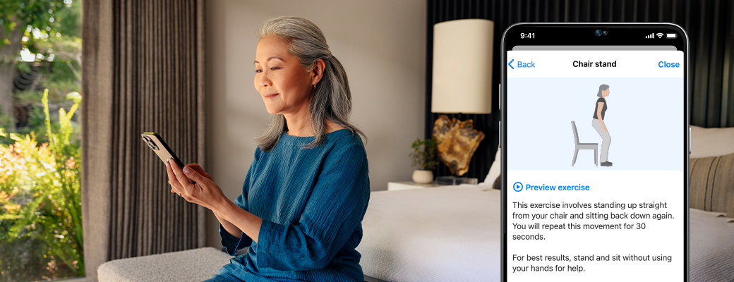 Image of woman looking at a Balance Assessment screen on her smartphone